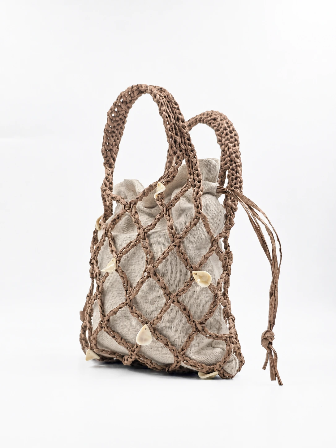 Coralia - Borsa a rete con manici integrati in rafia naturale realizzata a mano