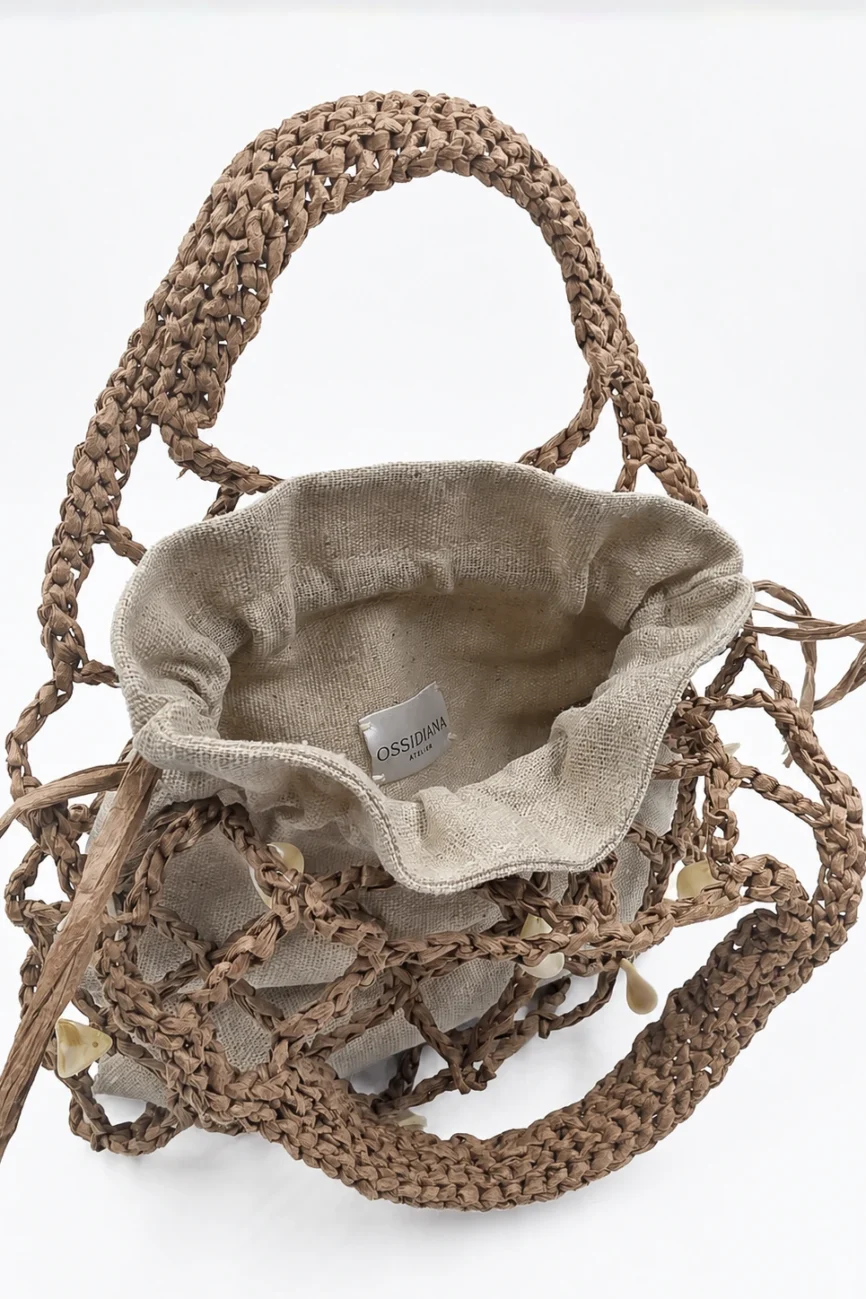 Coralia - Borsa a rete con manici integrati in rafia naturale realizzata a mano